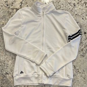 Womens white Adidas zip up jacket with black stripes I left sleeve.